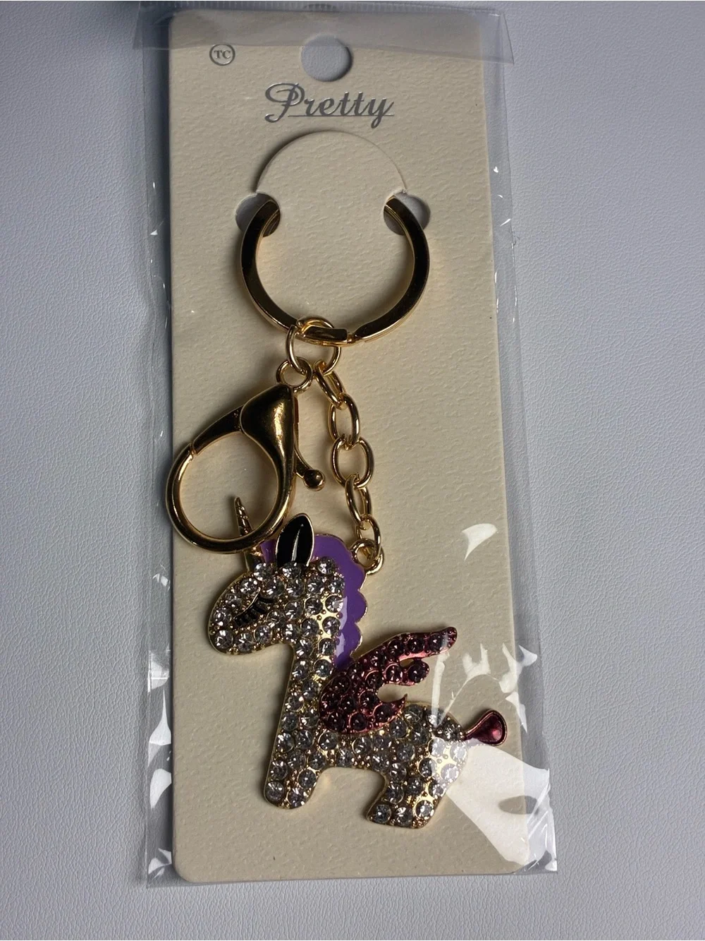 Gold Unicorn Keychain with Purple Mane and Pink Wings